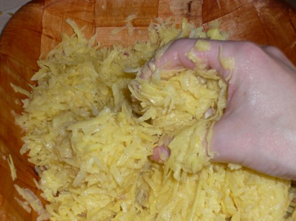 Mix grated potatoes and onions